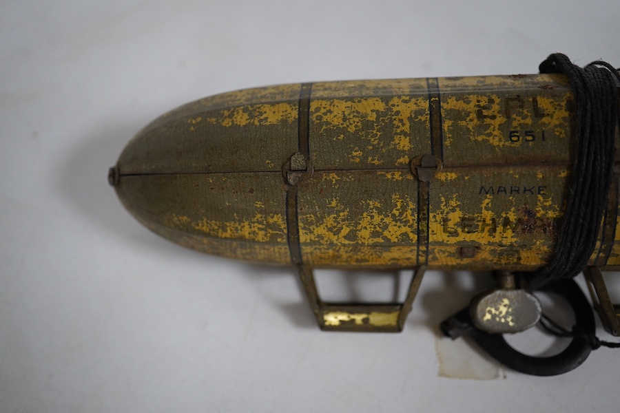 An early 20th century Lehmann tinplate clockwork EPL-1 zeppelin, 651, with rotating propellers to the rear. Condition - poor to fair, considerable losses to paint work, however clockwork motor still has some strength.